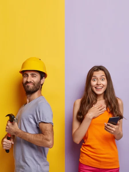 satisfied-foreman-wears-protective-yellow-helmet-holds-hammer-repairs-something-at-home_273609-27582.webp