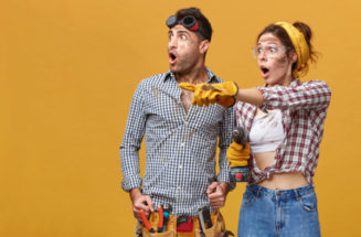 two-astonished-electricians-with-dirty-faces-looking-sideways-shock-woman-protective-gloves-goggles-pointing-her-finger-something-risk-high-voltage-resistance-hazards-work.jpg